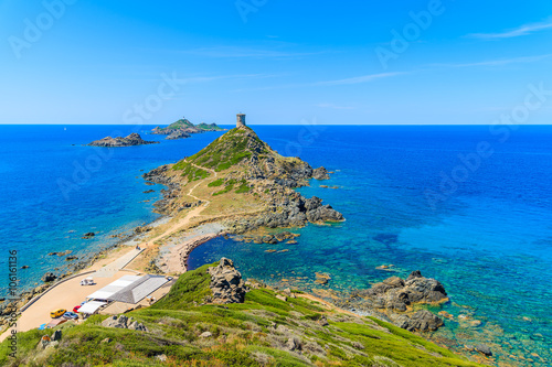 View of tower on Cape de la Parata and beautiful coast of Corsica island, France