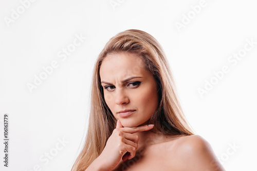 beautiful girl thinking on a white background