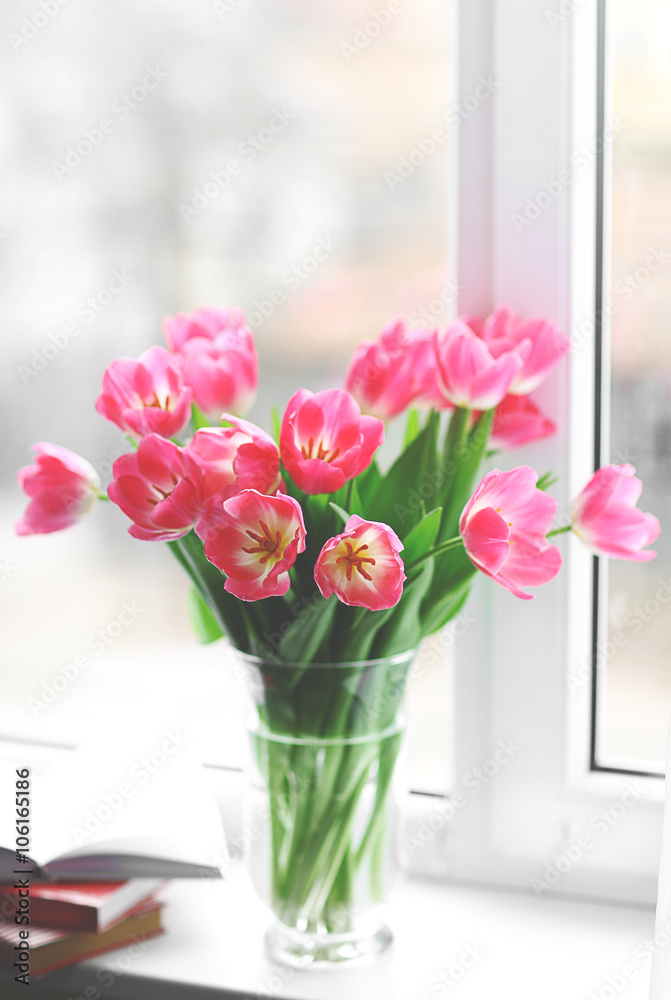 Fresh bouquet of tulips on a windowsill Fresh bouquet of tulips on a windowsill