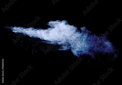 Cloud of powder on dark blue background