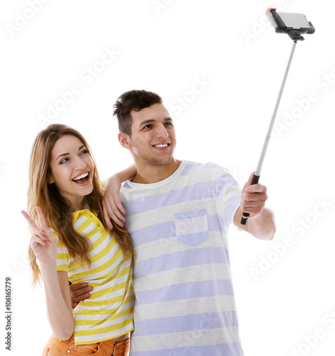 Young couple taking selfie ...