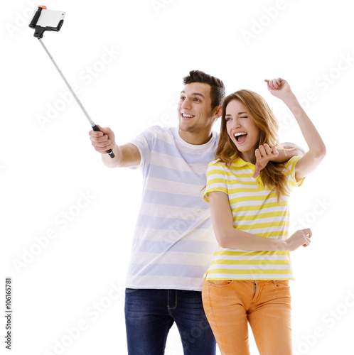 Young couple taking selfie ...