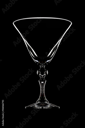Glass for cocktail on black background