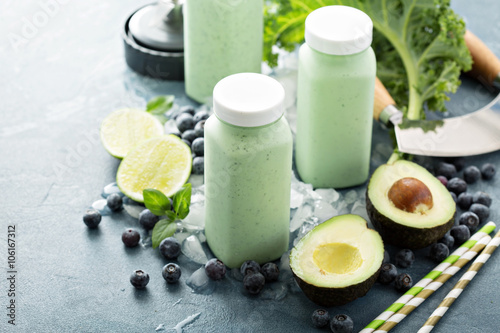 Green smoothies in small bottles to go