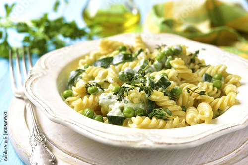 Fusilli with zucchini,grean pea and thyme. photo