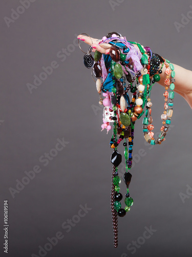 Canvas Print Closeup of woman with jewelry necklaces beads.