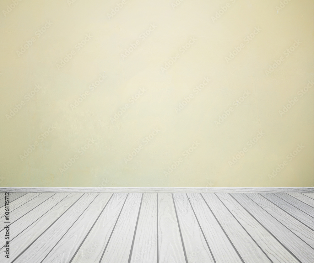 room interior with concrete wall and wood floor