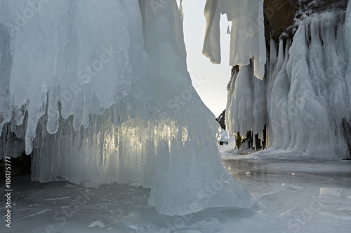 Huge icicles on rocks. photo