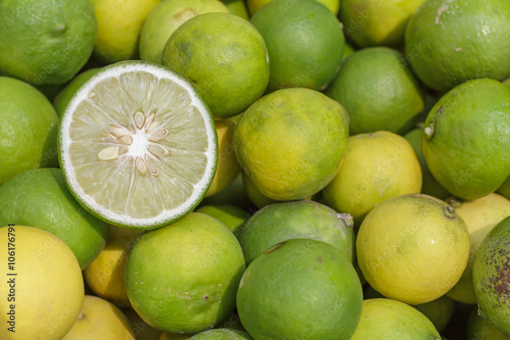Sliced limes. Green lime citrus fruit. Fresh juicy limes. Sliced limes. Green lime citrus fruit. Fresh juicy limes.