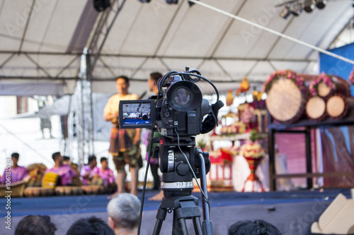 Video camera, scene on background, making video