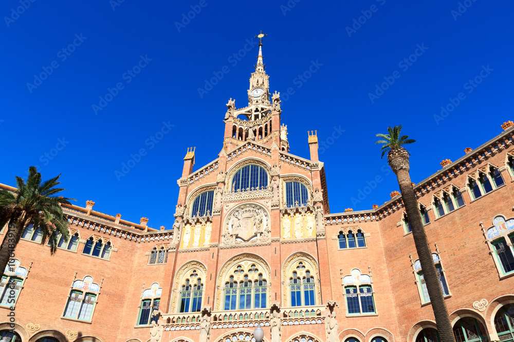 Hospital de Sant Pau and palm tree in Barcelona, Spain