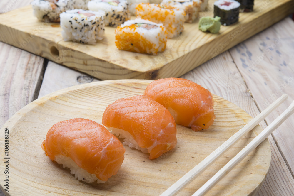 sushi with chopsticks sushi with chopsticks