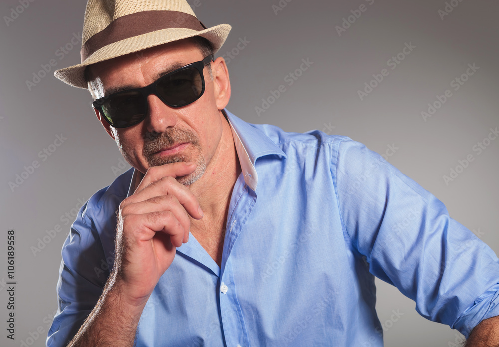 closeup portrait of pensive mature man with open shirt closeup portrait of pensive mature man with open shirt