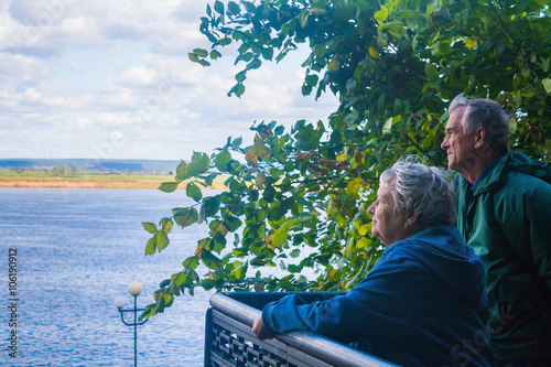 Senior man and woman looking at the river Kama (Tatarstan, Russi