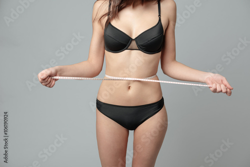 Woman with measuring tape