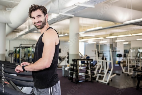 Smiling man on treadmill