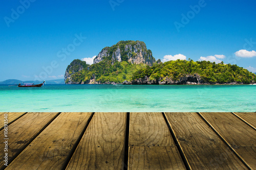 Tropical beach at Krabi with wooden plank