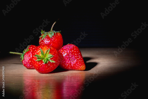strawberries on wooden..