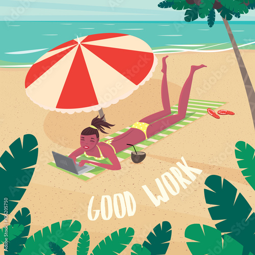 Slim girl in yellow swimsuit sunbathing on striped beach mat under the colorful parasol and working on a laptop on the beach - Business or freelance concept