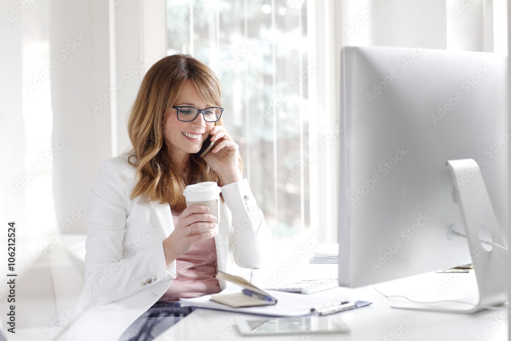 Businesswoman working at office Businesswoman working at office