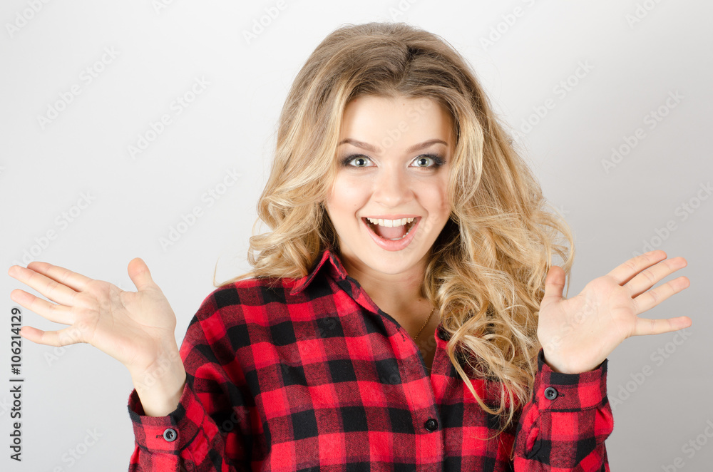 Surprised woman showing open hand palm Surprised woman showing open hand palm