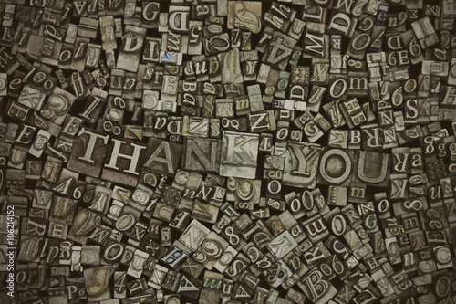 Close up of typeset letters with the words Thank You