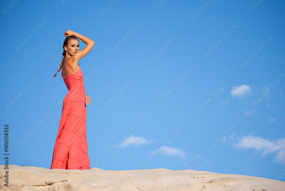 beauty woman in red dress on the desert beauty woman in red dress on the desert