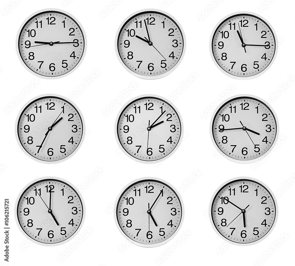 Collage of round wall clocks, isolated on white Collage of round wall clocks, isolated on white