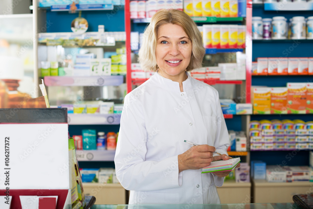 Female near counter in pharmacy