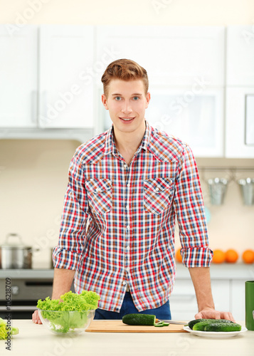 Happy handsome man in brigh...