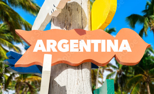 Argentina signpost with palm trees