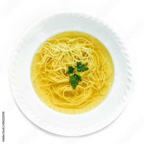 Chicken broth soup with noodles.