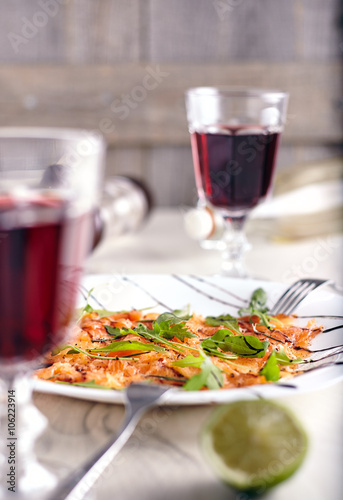 Top view of salmon carpaccio