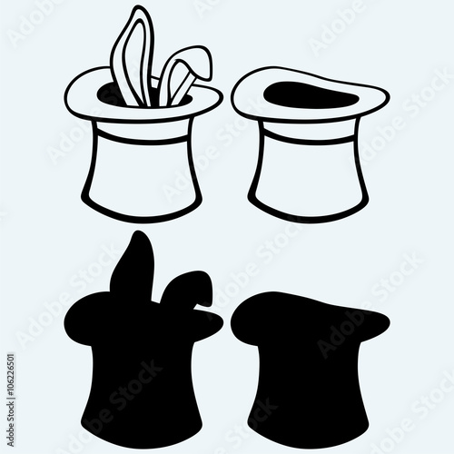 Rabbit in a magician hat. Isolated on blue background. Vector silhouettes