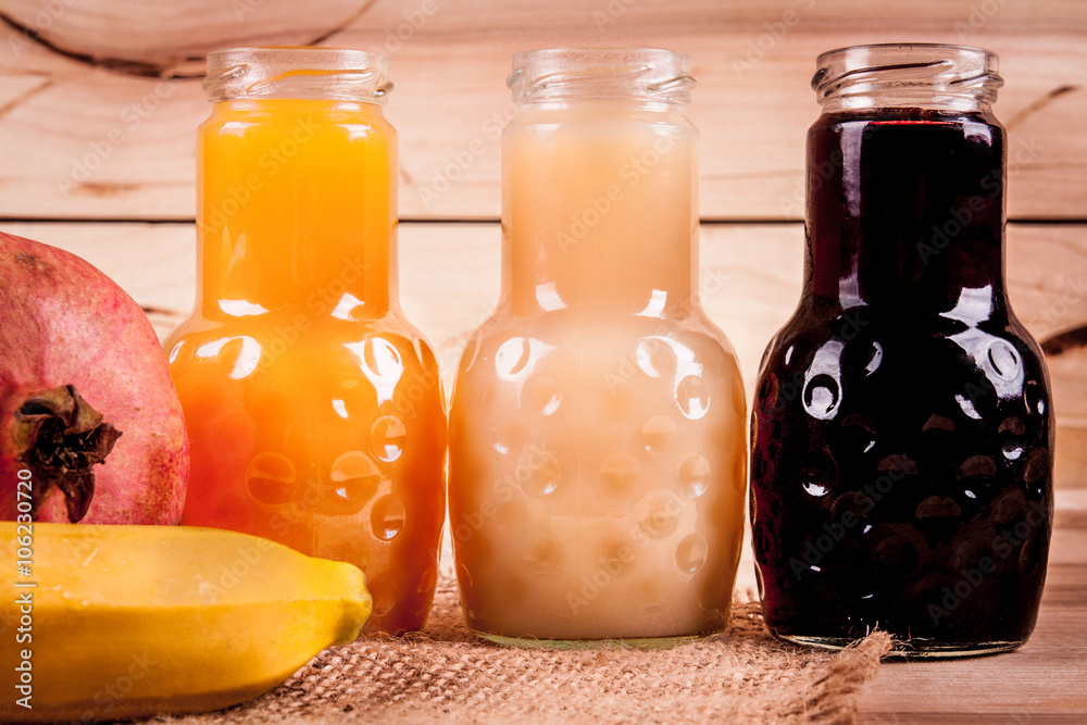Juice in assortment - a banana, an orange, a grant Juice in assortment - a banana, an orange, a grant