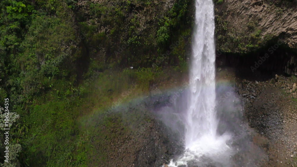 Capture the breathtaking beauty of Tungurahua,Ecuador with an awe inspiring aerial tilt shot showcasing the majestic Manto de la Novia waterfall. Capture the breathtaking beauty of Tungurahua,Ecuador with an awe inspiring aerial tilt shot showcasing the majestic Manto de la Novia waterfall.