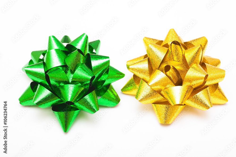 Gold and green bows on white background Gold and green bows on white background