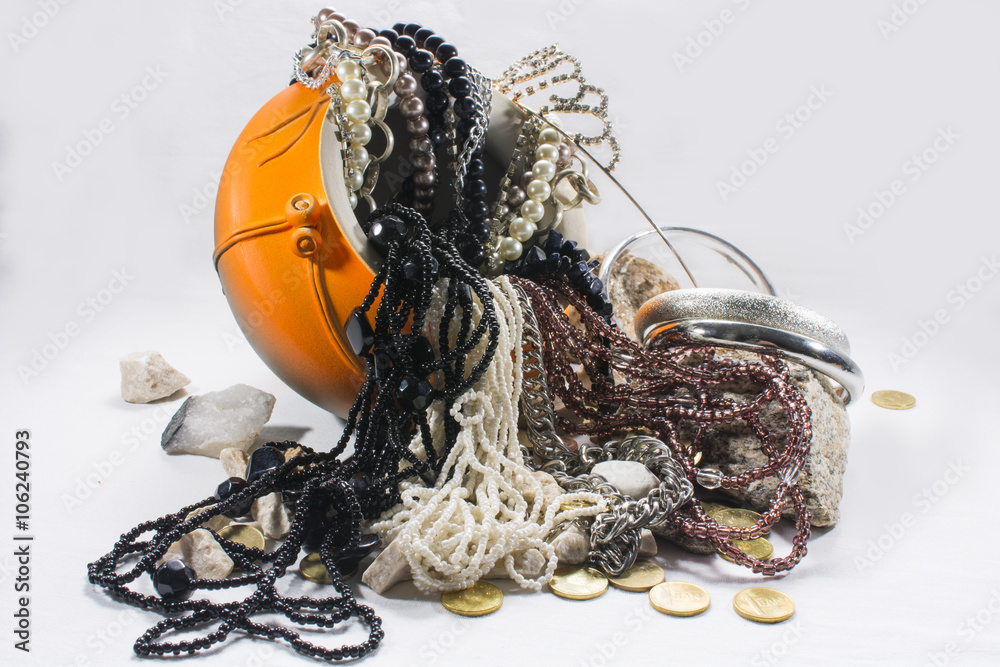 Ceramic pot and jewels on white background Ceramic pot and jewels on white background