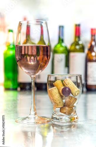 get drunk with rose wine  soft drink in glass with many wine cork