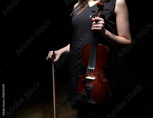 Canvas Print Woman holding violin and fiddlestick