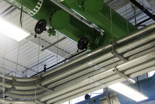 Pipes and Valves in Industrial Building.