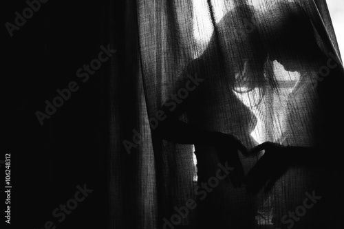 Silhouette beautiful pregnant woman and man holding hands on a c