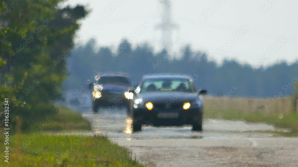 3 in 1! The movement of vehicle on a country road in the background of forest. Real time