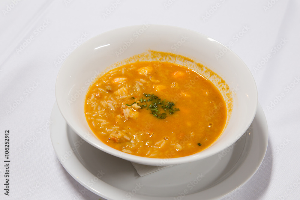Spicy Thai soup Tom Yam with Coconut milk, Chili pepper and Seafood Spicy Thai soup Tom Yam with Coconut milk, Chili pepper and Seafood