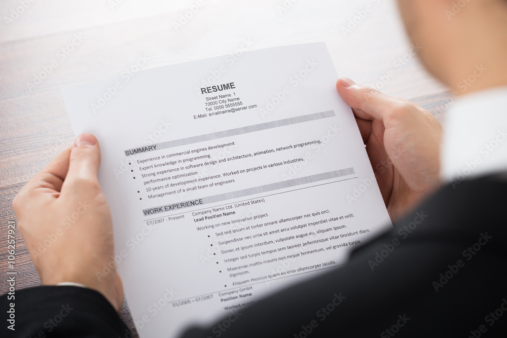 Businessman Holding Resume Businessman Holding Resume