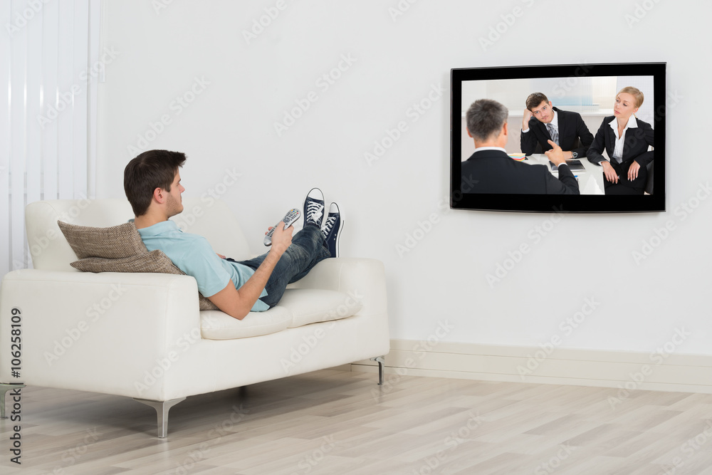 Young Man Watching Television