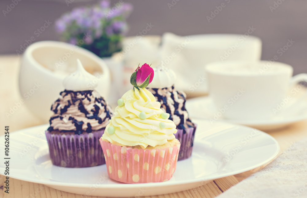 Chocolate Cupcake with chocolate frosting on the table Chocolate Cupcake with chocolate frosting on the table