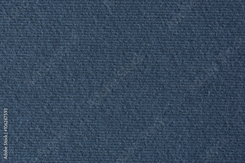 Dark blue lined paper texture background.