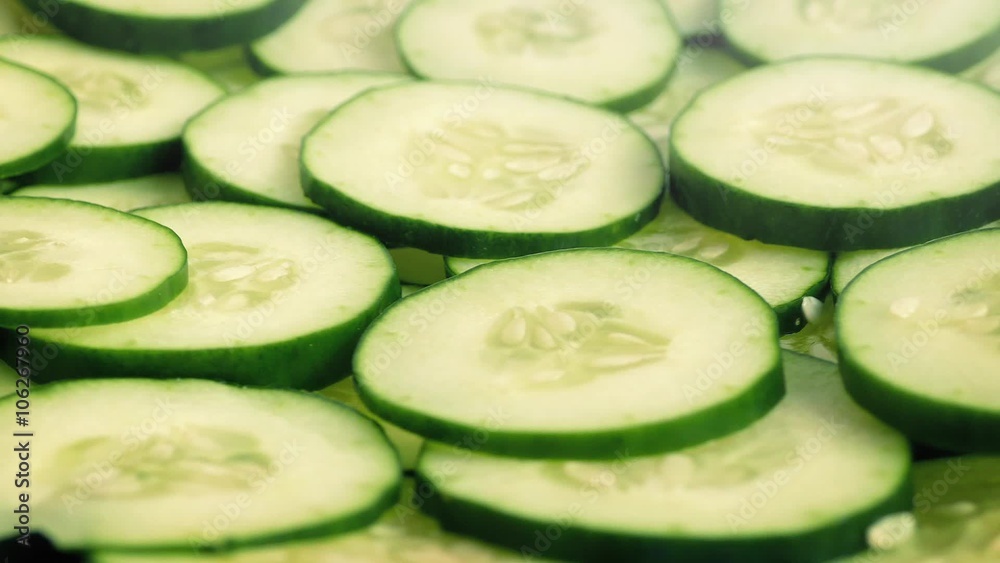 Cucumber Slices Rotating On Plate Cucumber Slices Rotating On Plate