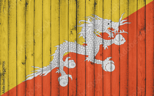 Flag of Bhutan painted on wooden frame photo